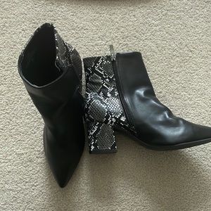Black pointed snakeskin booties